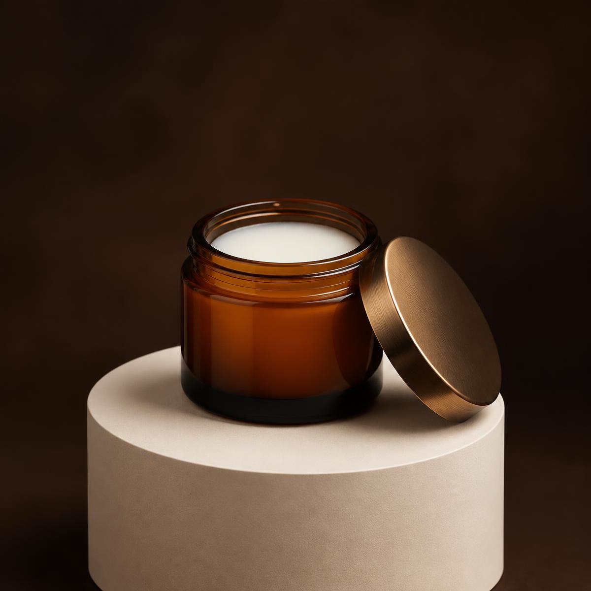 Relief 360 amber jar with bronze lid on an ivory pedestal